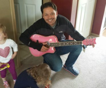 Tuning my daughter Elise's first guitar