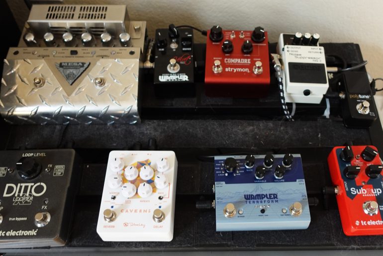 A guitar pedalboard containing: Mesa Boogie V-Twin, Wampler Velvet Fuzz, Strymon Compadre, Boss NS-2 Noise Suppressor, TC Electronic Poly Tune 3 Noir, TC Electronic Ditto Looper X2, Keeley Caverns Delay + Reverb, Wampler Terraform, and TC Electronic Subnup Octaver