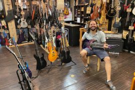 Michael Pellegrini trying out guitars at the ESP store in Tokyo